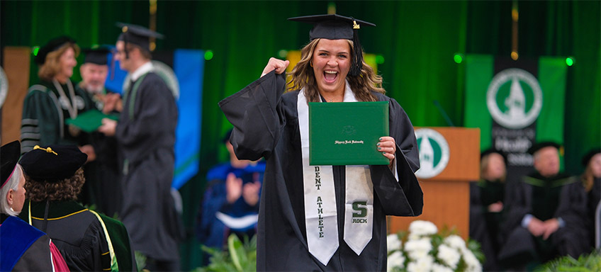 Student celebrating graduation