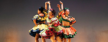 Three women preforming an exotic dance