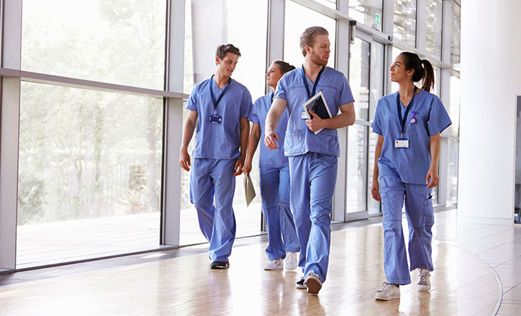 Nurses walking in a hall