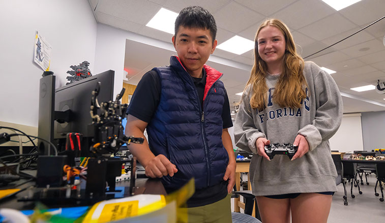 Student and professor conducting research