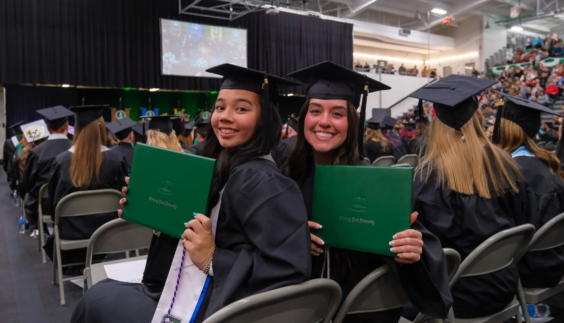 Students celebrating graduation