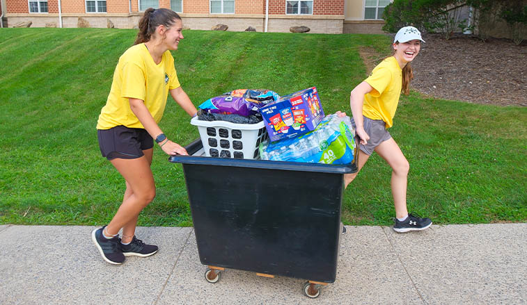 Students helping with move-in day