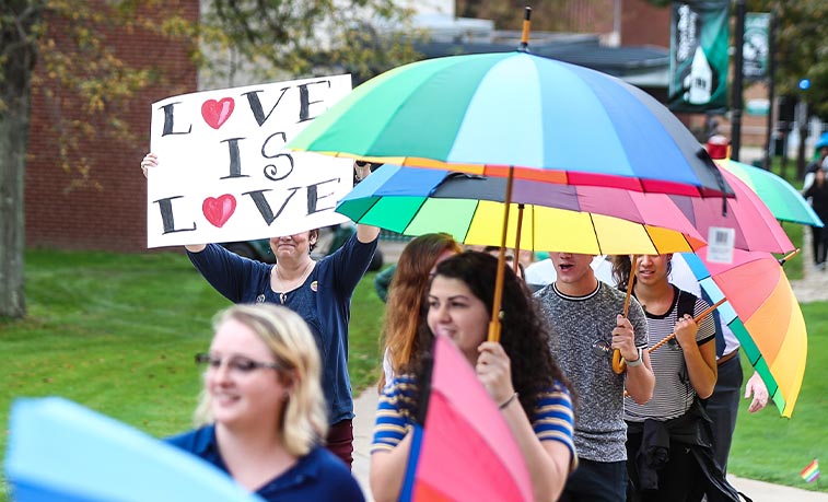 Students marching across campus