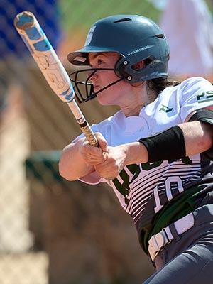 Portrait of Alexsa Hurd at bat in a softball game